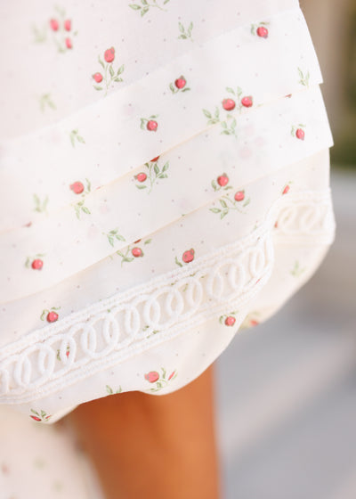 Close up of the sleeve detail on the ivory floral dress