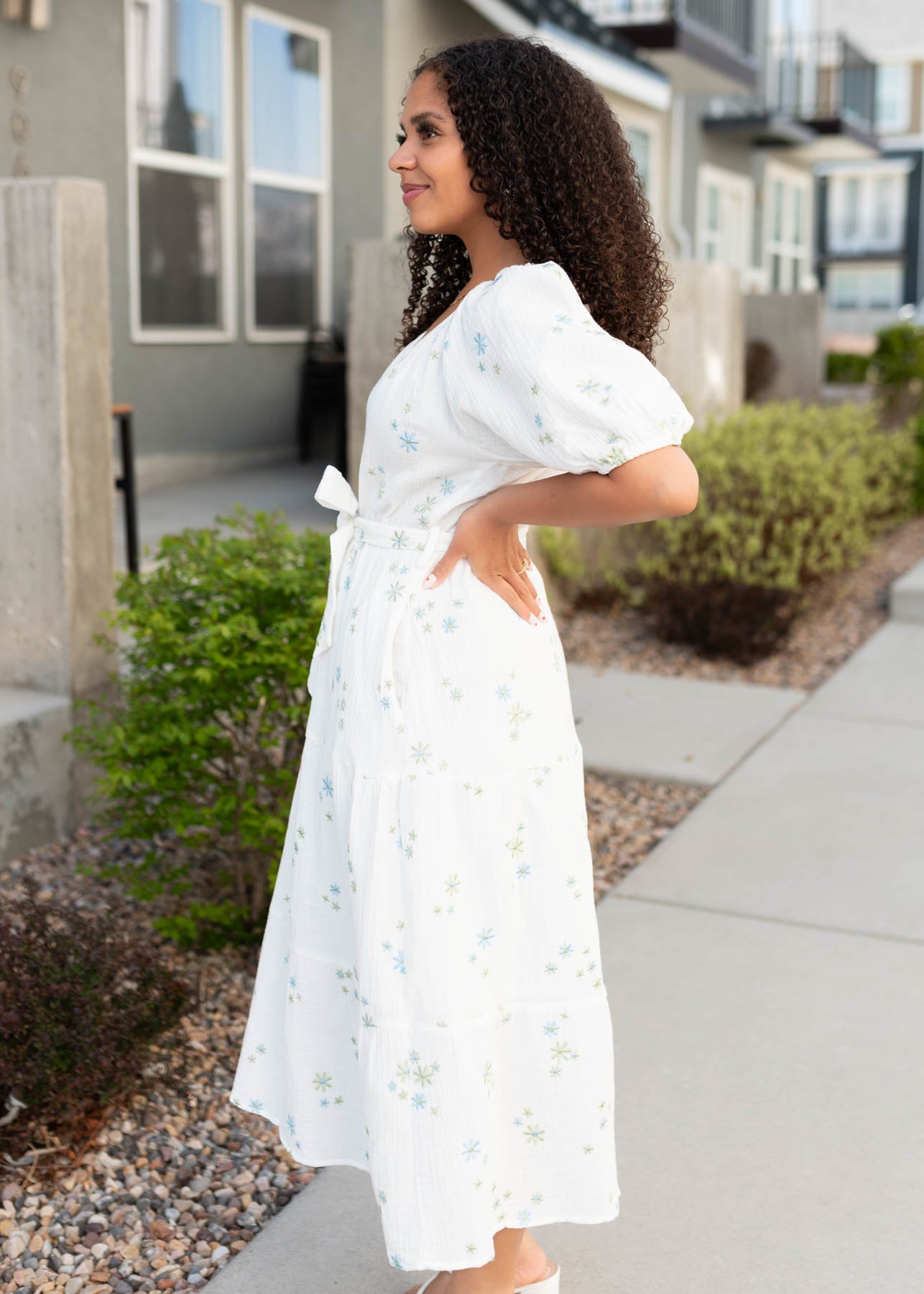 Side view of the white flower embroidered dress