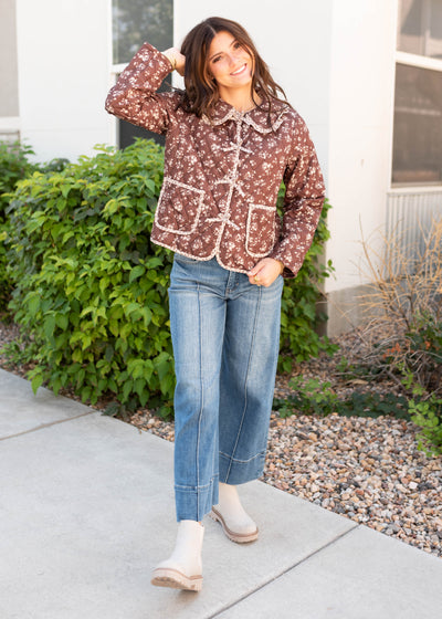 Brown floral jacket with long sleeves in a small