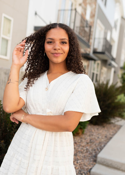 Modest short sleeve ivory textured tie dress