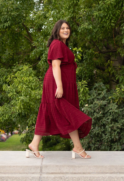 Side view of the mddest plus size maroon textured tie dress at lena layne
