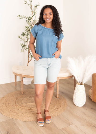 Small embroidered denim top