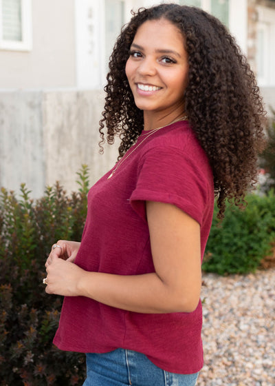 Side view of the burgundy top