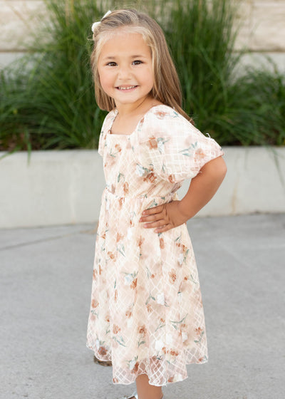 Side view of the floral lace little girls dress with elastic waist