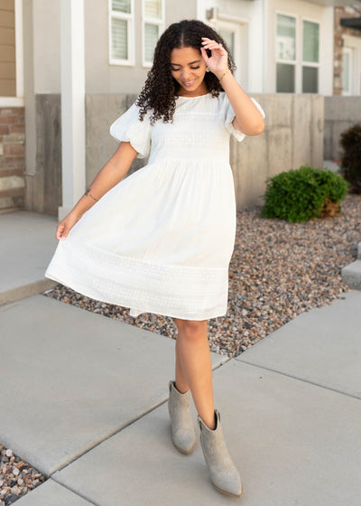 Knee length white embroideted dress