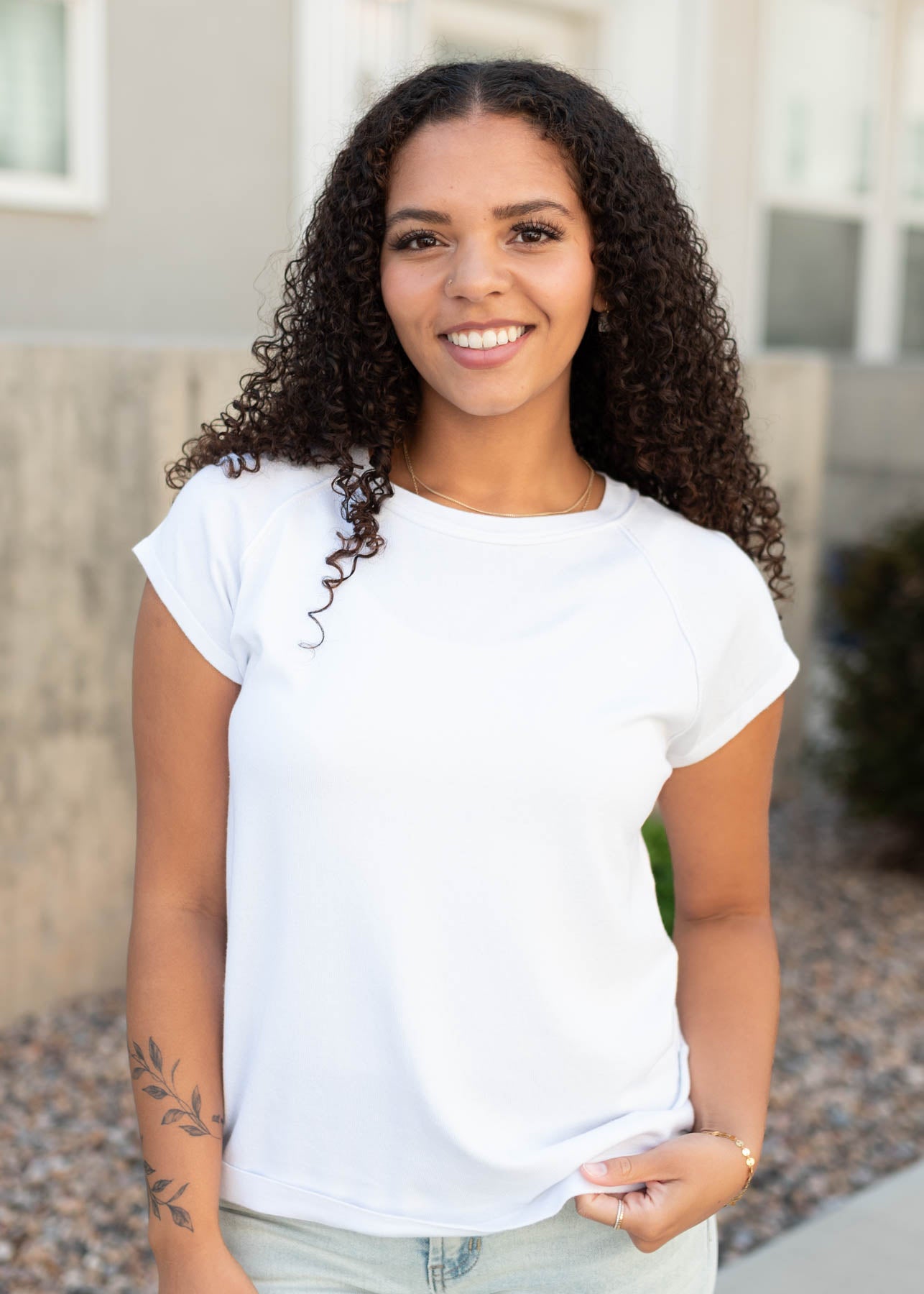 Cap sleeve on the white reaglen top