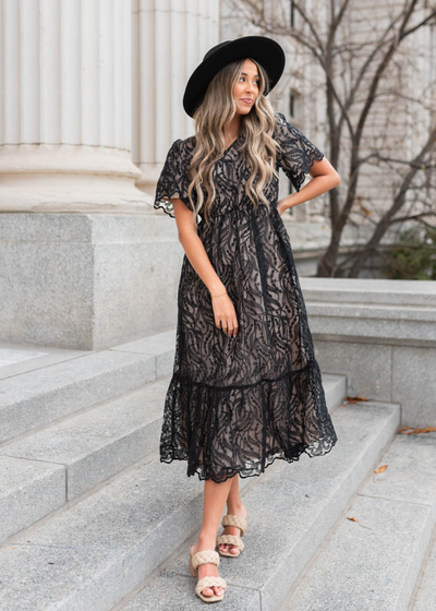 Short sleeve lace black dress with wide ruffle hem