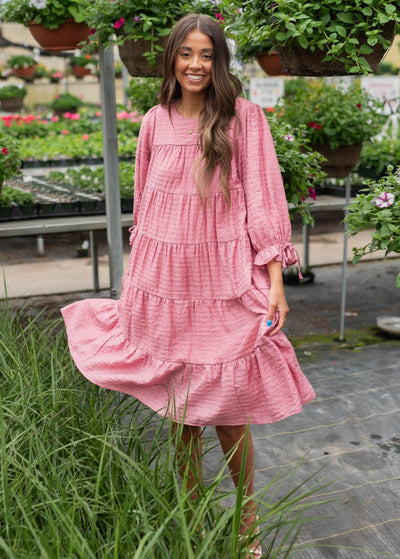 Pink long sleeve dress thats tiered