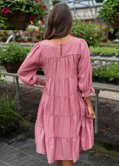 Back view of the pink long sleeve dress