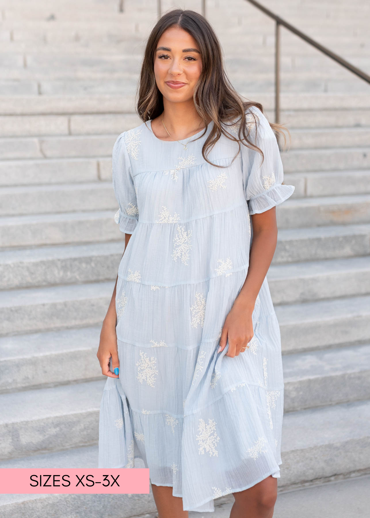 Soft blue dress with short sleeves