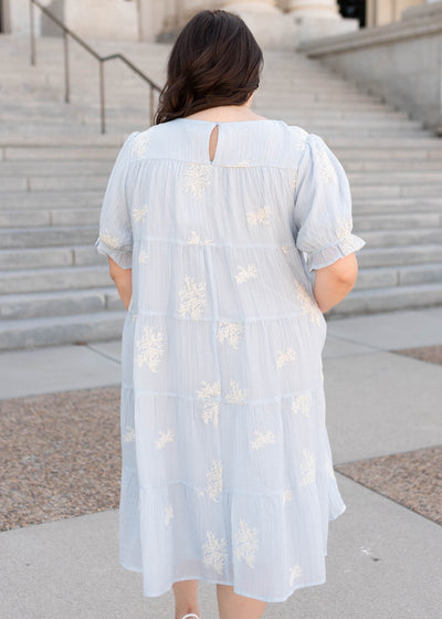 Back view of the plus size soft blue dress