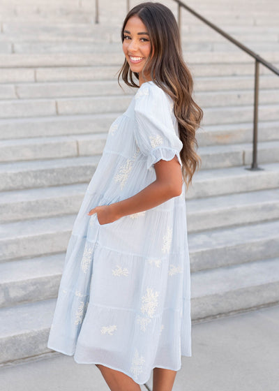 Side view of the soft blue dress with pockets