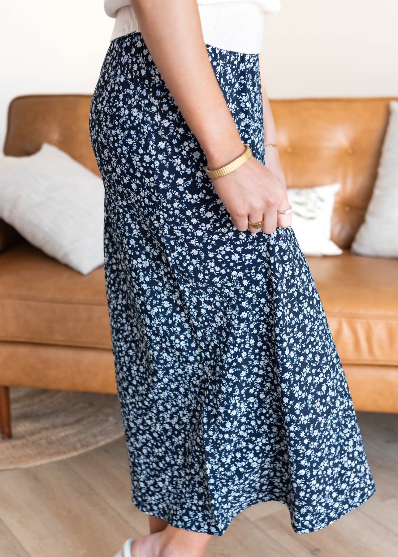Side view of the navy floral skirt