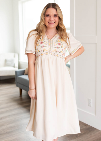 Cream embroidered dress