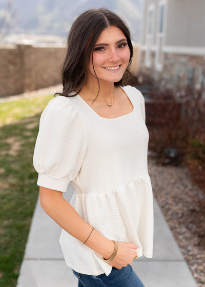 Short sleeve cream ruffle top