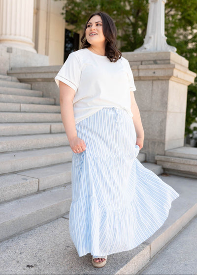 Tie at the waist on the blue pinstripe skirt in plus size