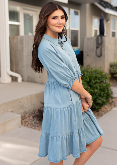 Side view of the chambray tiered dress with midlength sleeves