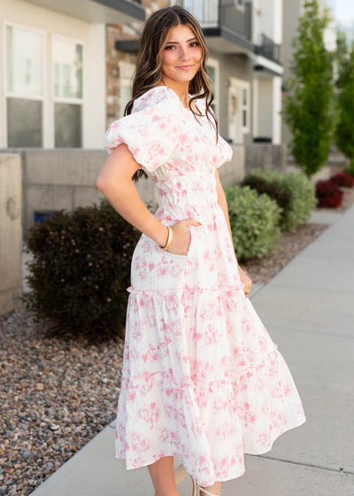 Side view of the pink floral dress with pockets