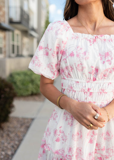 Close up of the fabric on the pink floral dress