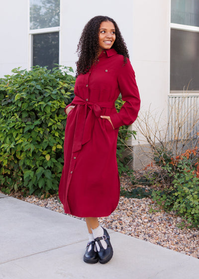 Modest midi long sleeve burgundy button up dress with a tie at the waist