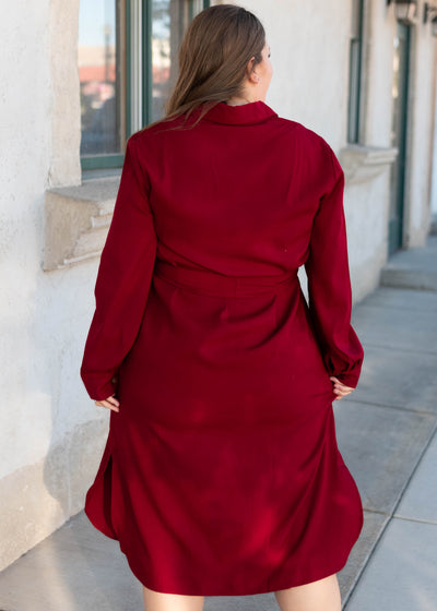 Back view of the plus size burgundy button up dress
