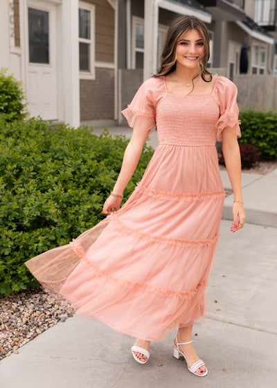Dusty coral dress with smocked bodice