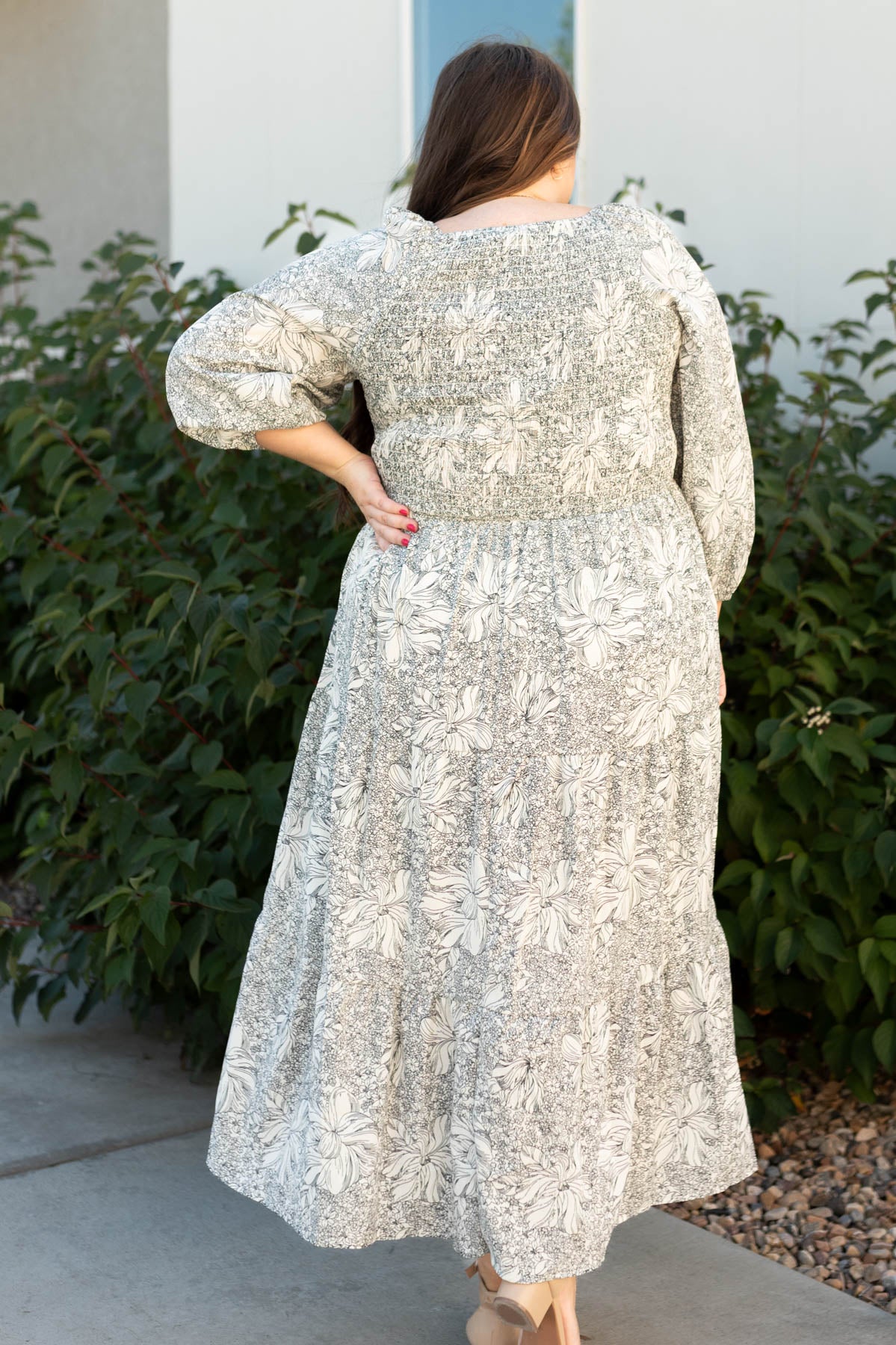 Back view of a plus size floral dress