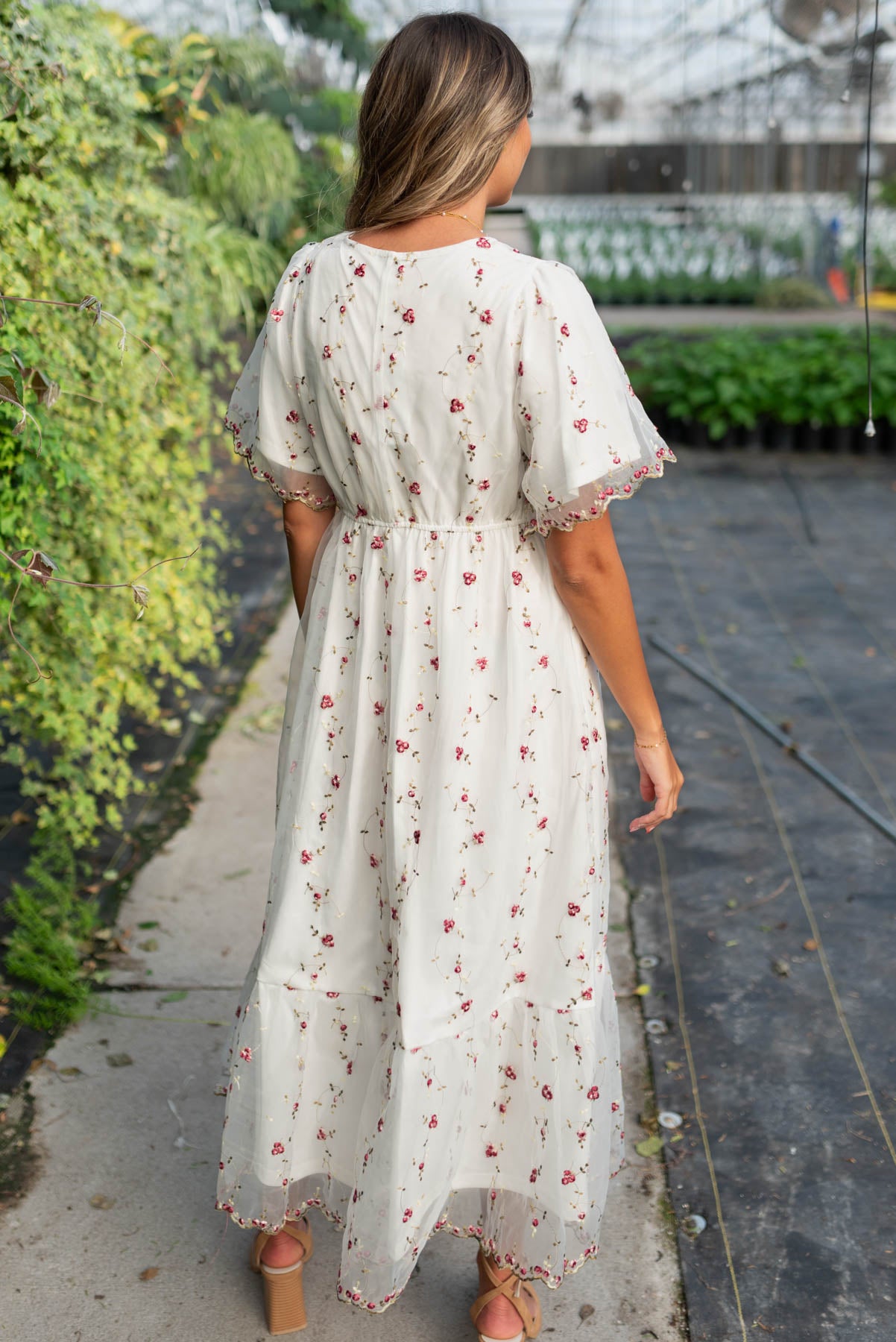 Back view of the ivory embroidered floral dress