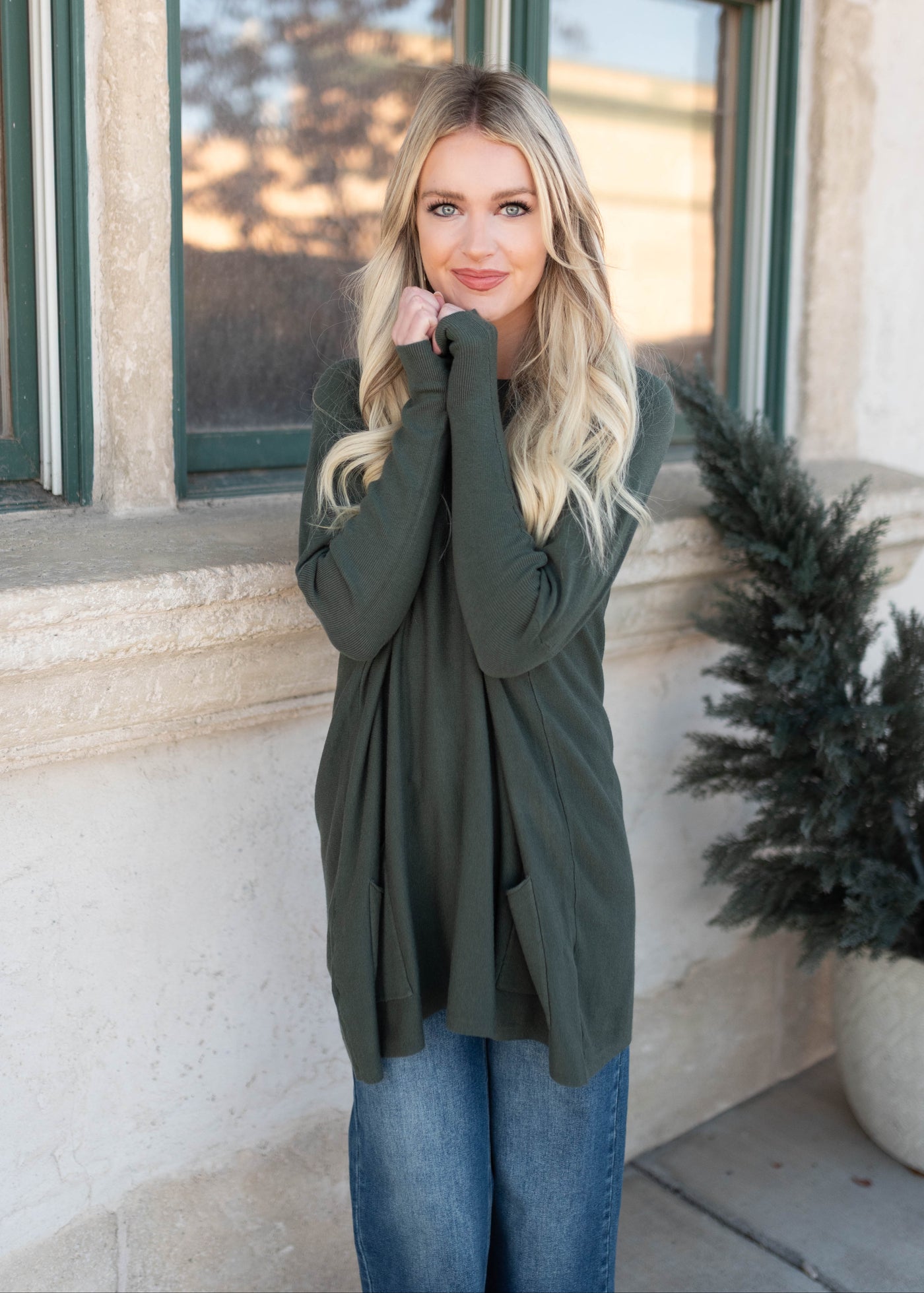 Long sleeve dark green pocket sweater