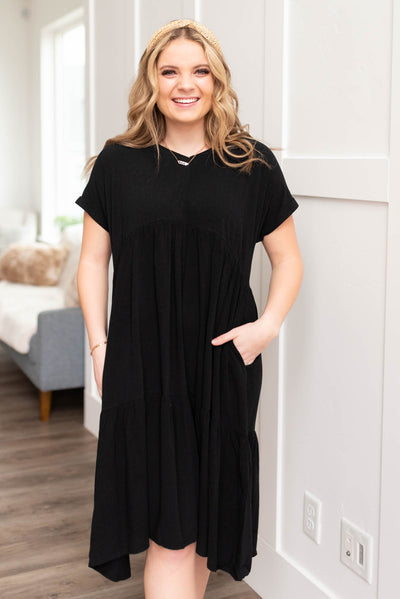 Below the knee black tiered dress