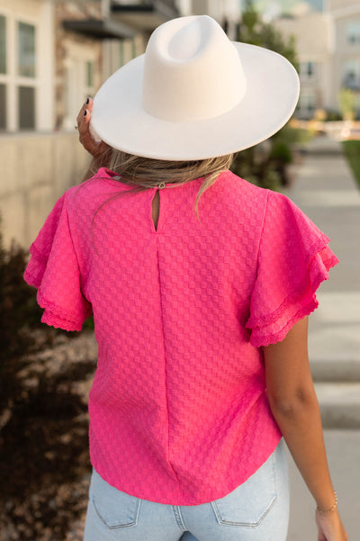 Back view of a pink top