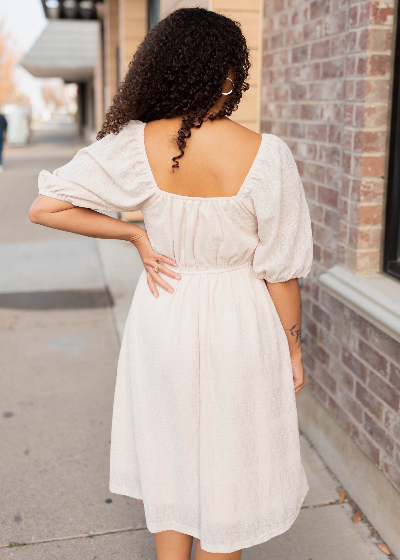Back view of the cream square neck dress
