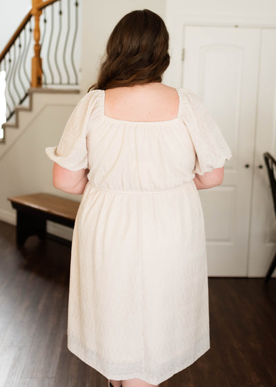 Back view of the plus size cream square neck dress