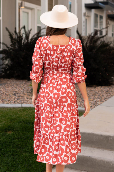 Back view of a brick floral dress