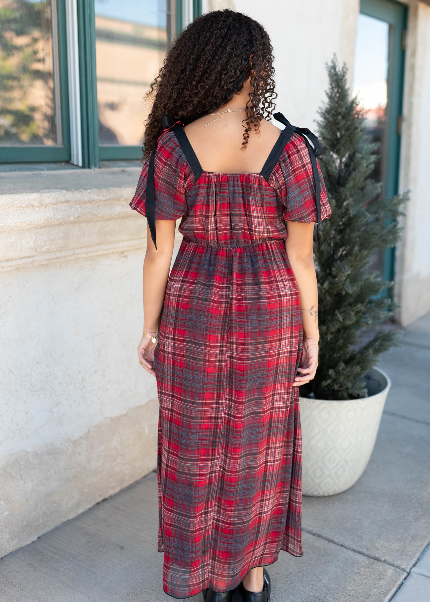Back view of the red plaid bow dress