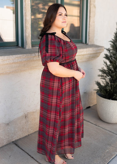 Side view of the red plaid bow dress in plus size