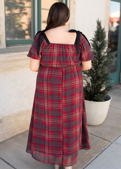 Back view of the plus size red plaid bow dress