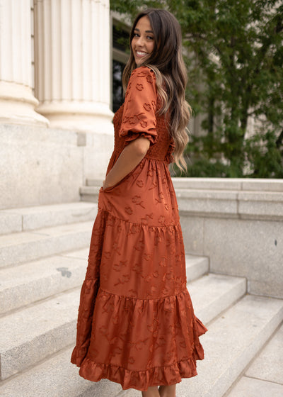 Side view of the sienna smocked dress with pockets