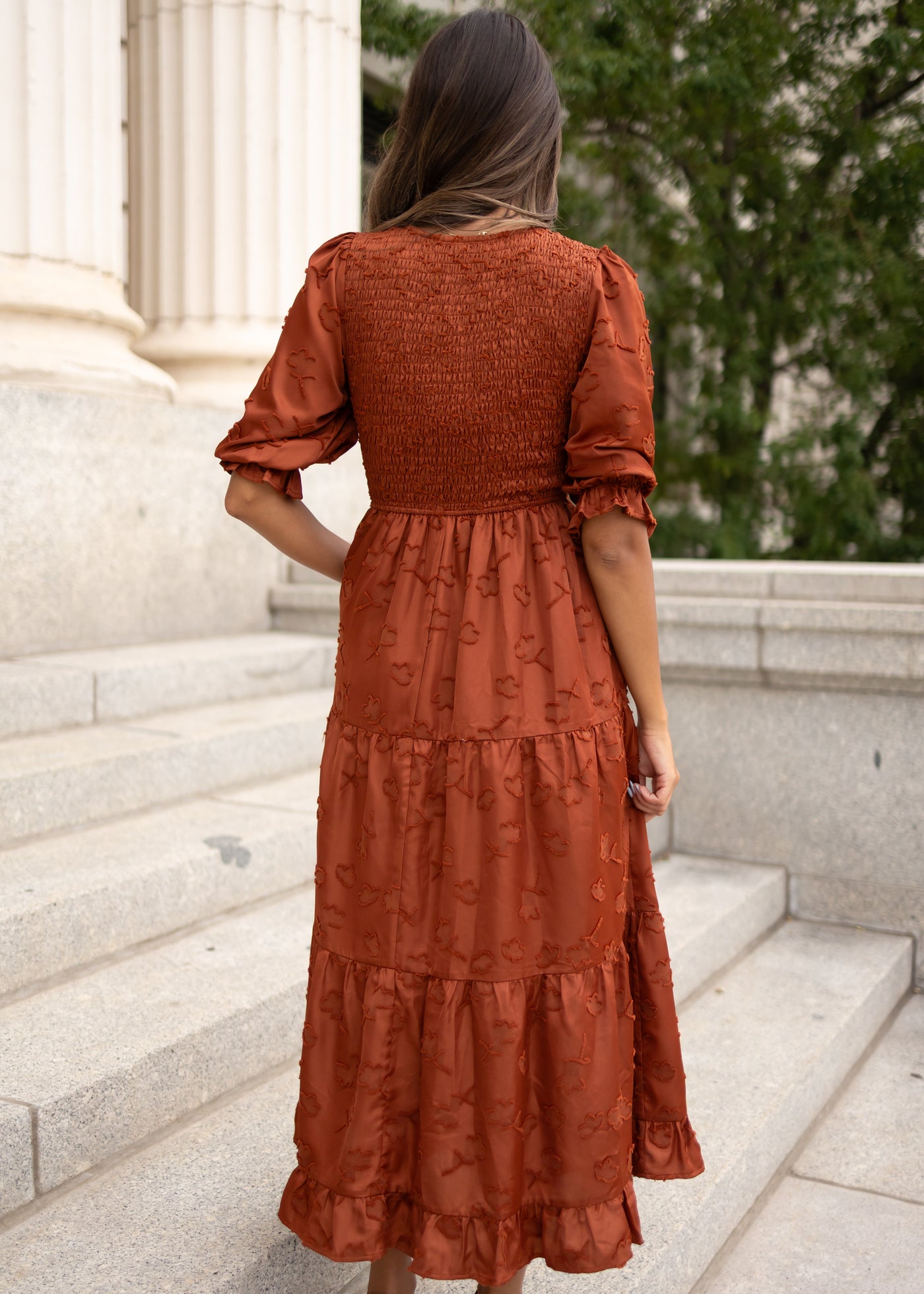Back view of the floral sienna smocked dress 