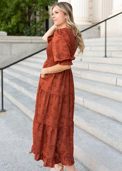 Side view of the sienna smocked dress with pockets