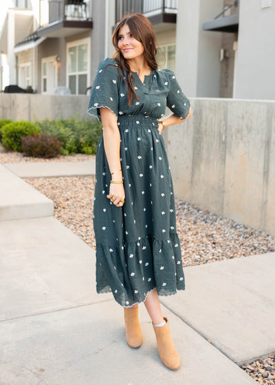 Dark teal floral dress with white embroidered flowers