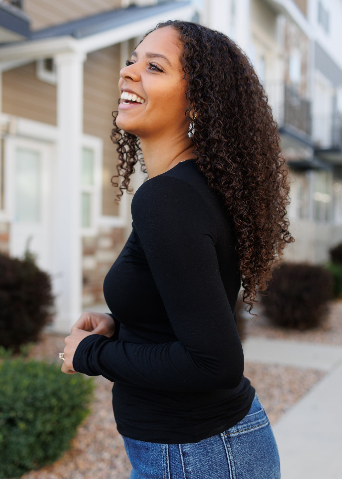 Side view of the long sleeve black top
