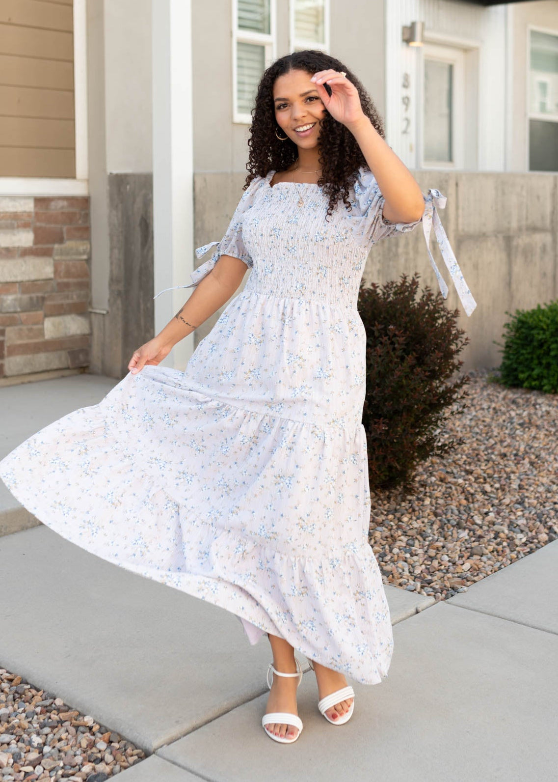 Lavender floral dress with short sleeves and bows