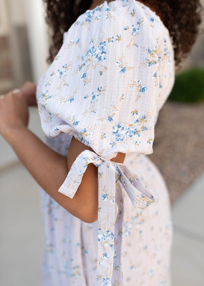 Close up of the sleeve and fabric on the lavender floral dress