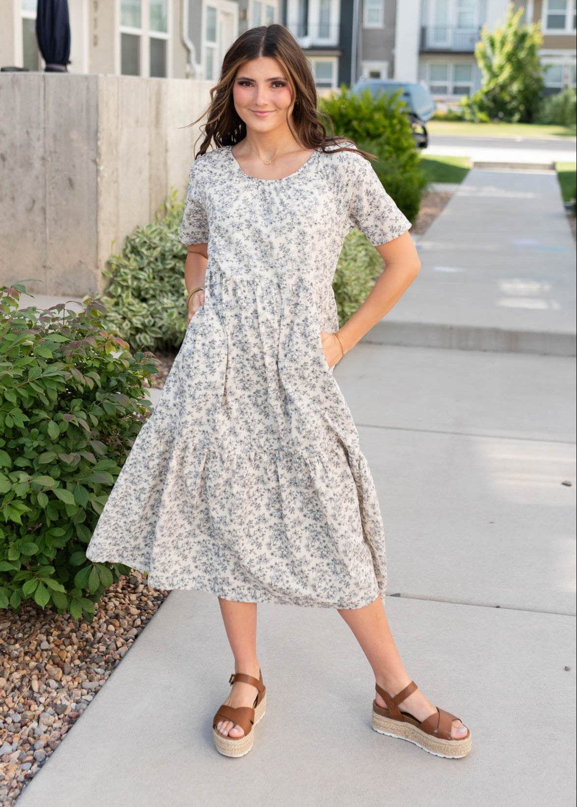 Navy flowers on the cream floral tiered dress with pockets