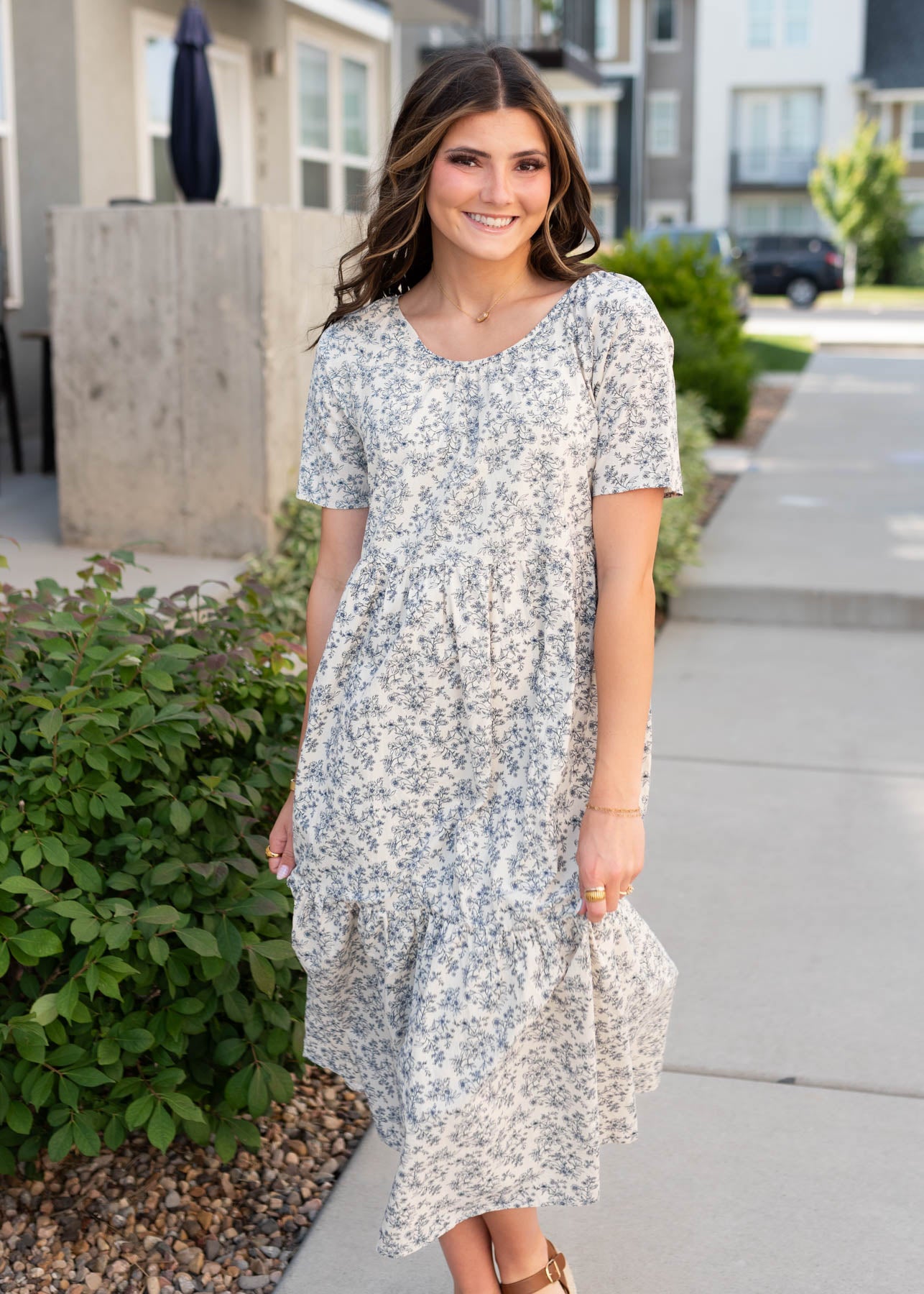 Short sleeve cream floral tiered dress with navy flowers