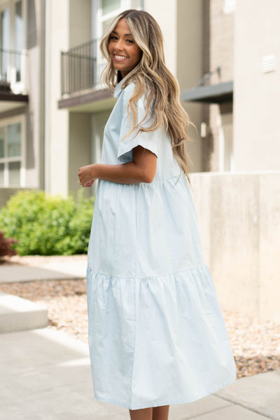 Side view of a bluebell light blue dress