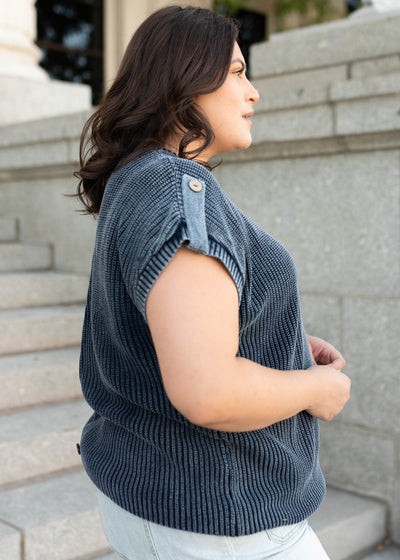 Side view of the navy knit sweater in plus size with short sleeves