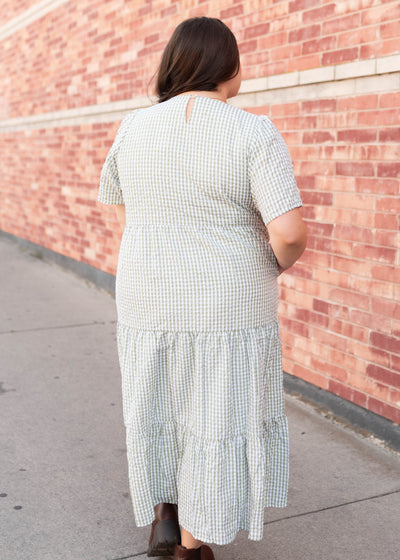 Back view of the sage gingham dress in plus size