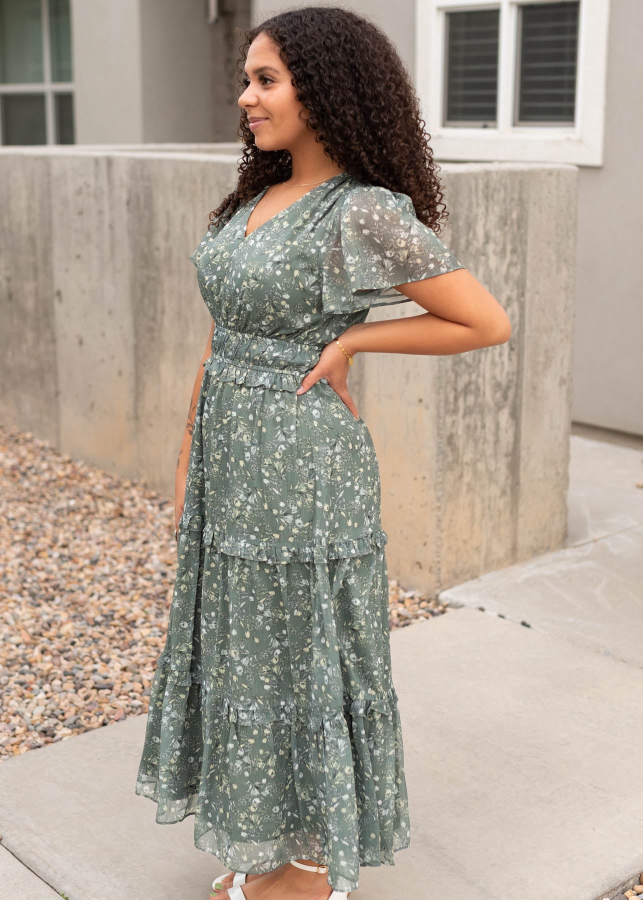 Side view of the modest sage floral dress